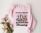 Women’s Crewneck Sweatshirts - Life’s a mess but my Plants are Thriving Hippo Boutique