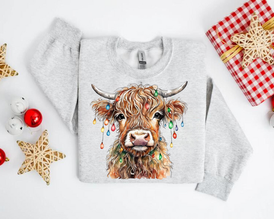 Highland Cow Lights Christmas Sweatshirts Hippo Boutique
