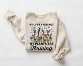 Women’s Crewneck Sweatshirts - Life’s a mess but my Plants are Thriving Hippo Boutique