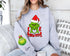 Custom mama Christmas Sweatshirt with children’s name on sleeve Hippo Boutique