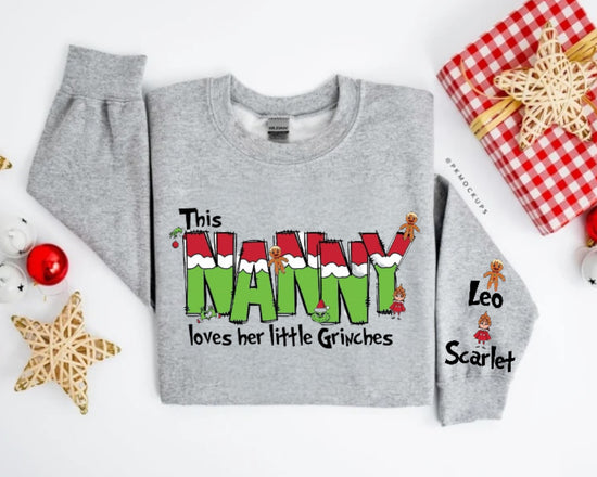 Custom Christmas Nanny Sweatshirt with children’s name on sleeve Hippo Boutique