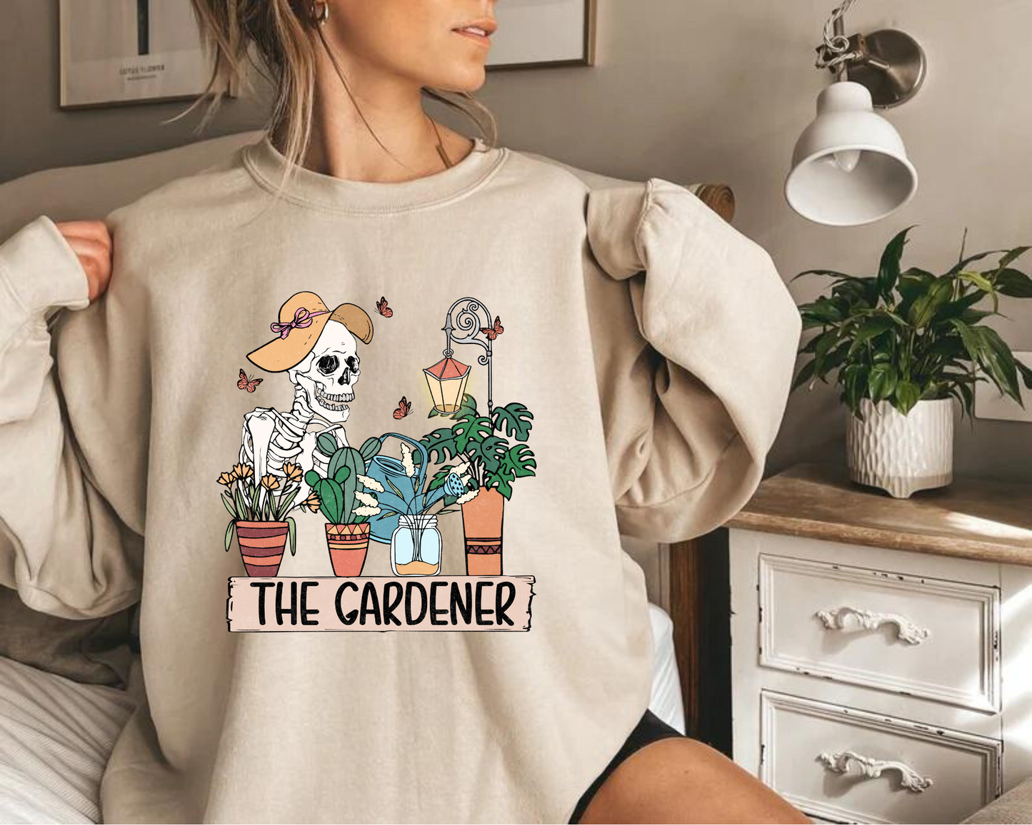 Women’s Crewneck Sweatshirts - The Gardener Skeleton Hippo Boutique