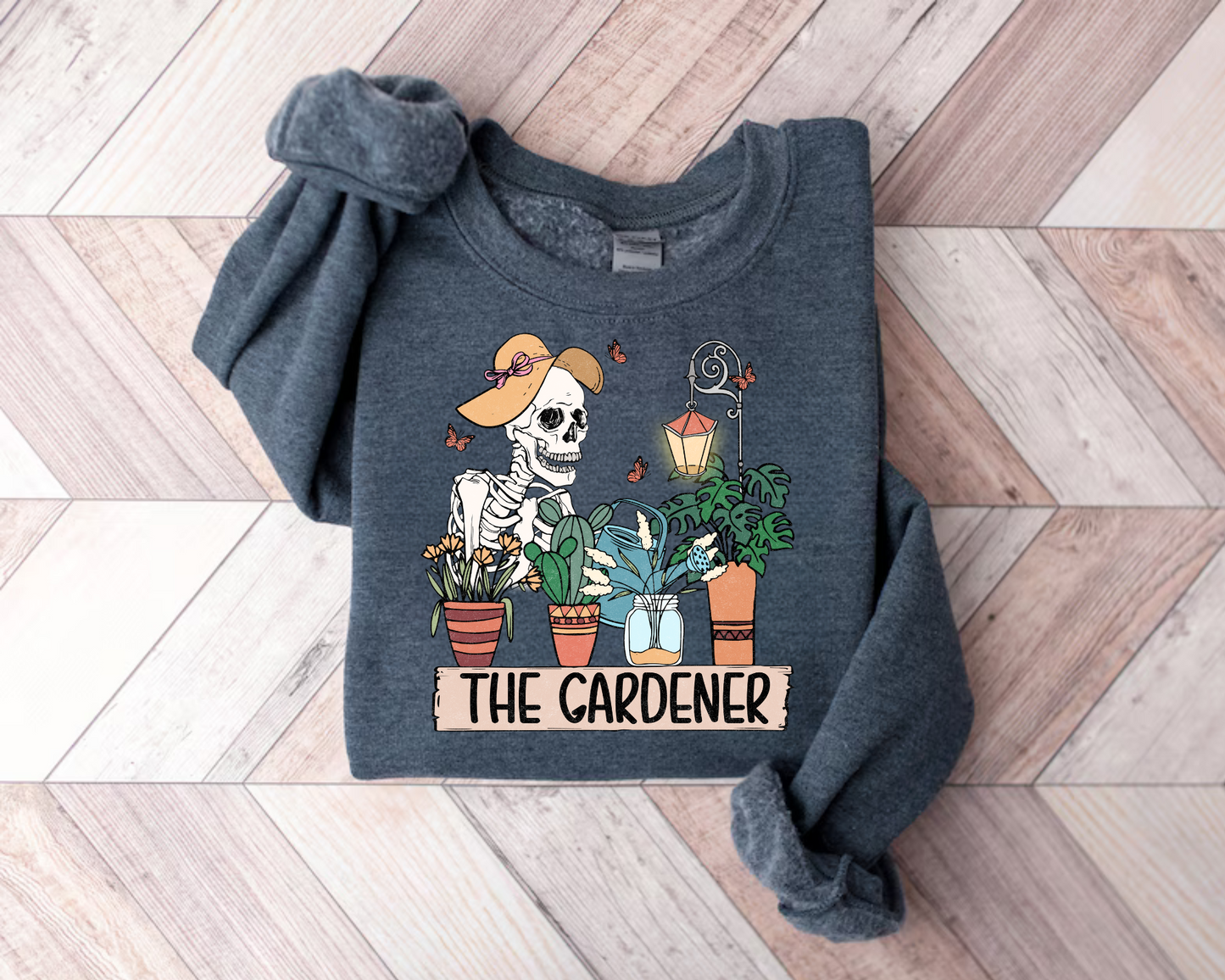 Women’s Crewneck Sweatshirts - The Gardener Skeleton Hippo Boutique