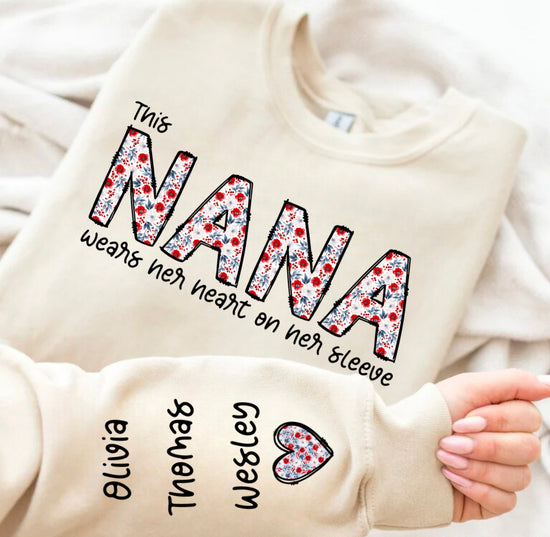 Custom Floral Nana Sweatshirt with children’s name on sleeve Hippo Boutique