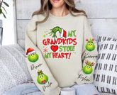 Custom Grandma & Grandpa Christmas Sweatshirt with children’s name on sleeve Hippo Boutique