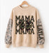A beige crewneck sweatshirt hanging on a wooden hanger against a white background. The sweatshirt features &